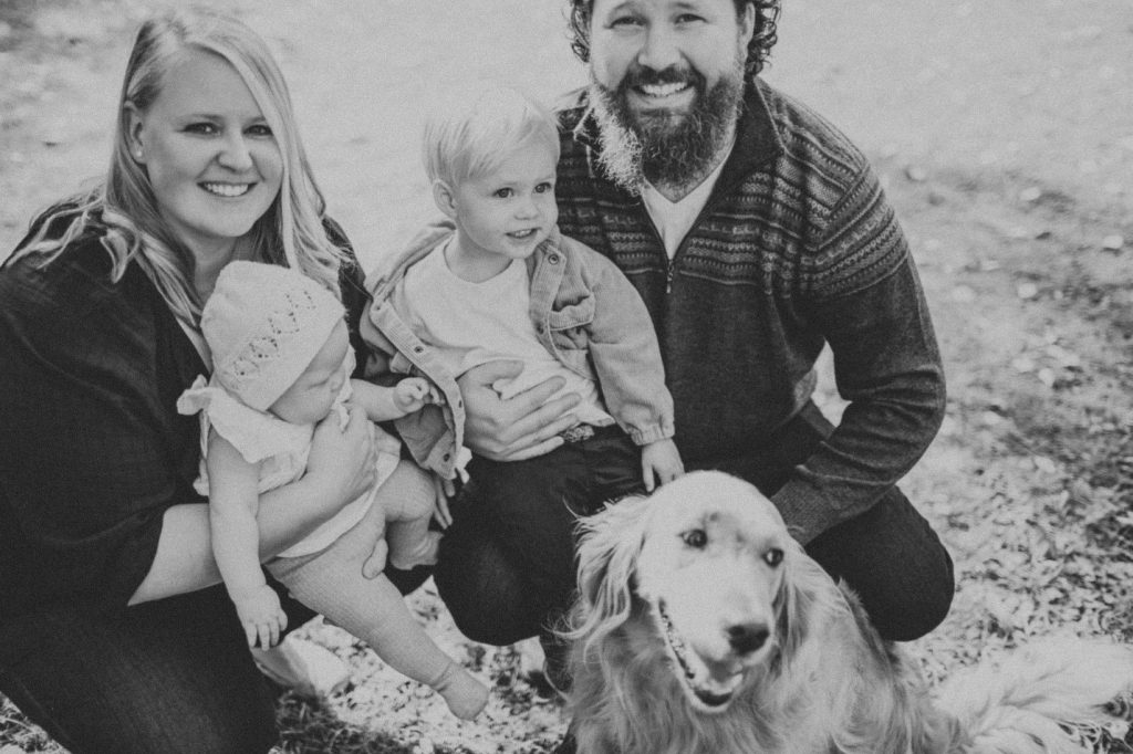 Nik and Marnie Venema with their dog and their two young children.