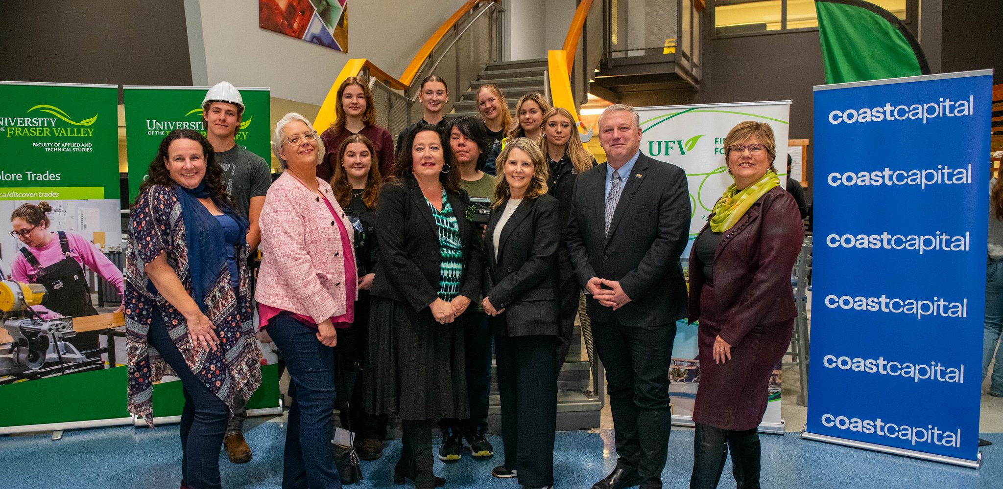 A group of UFV leaders and students pose together with Coast Capital at the funding announcement