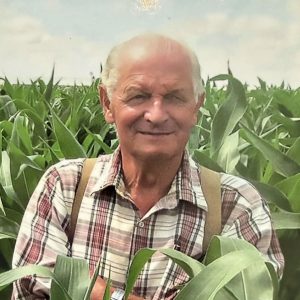 Henry Jacobs standing in a corn field